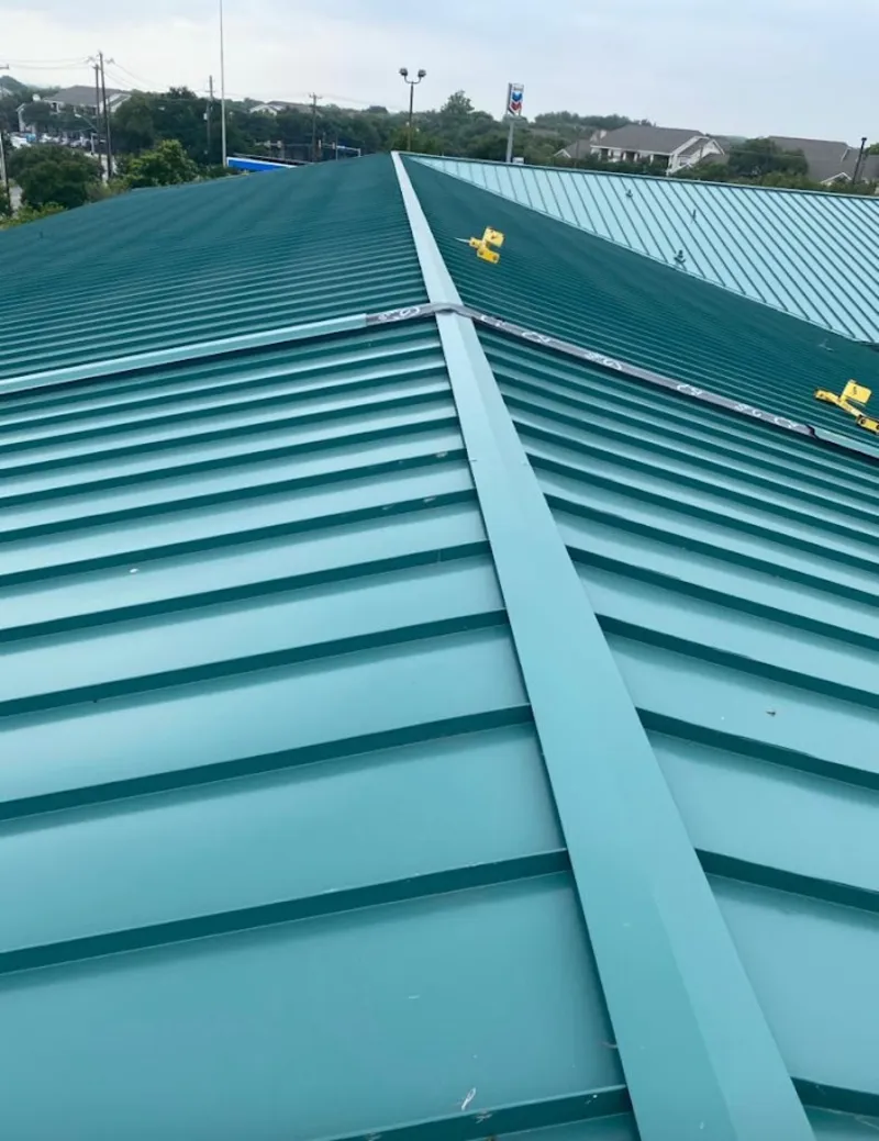 Green commercial metal roof ridge and valley for Metal Roof Repair in Norfolk
